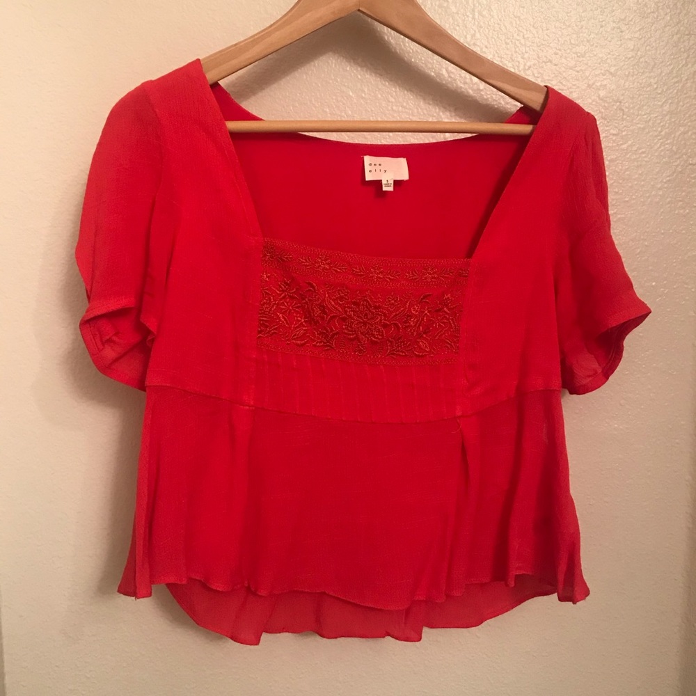 red flowy top